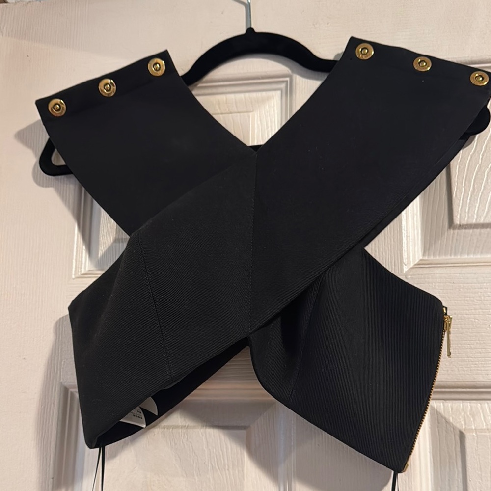 Chic Black Crossbody Top with Gold Accents